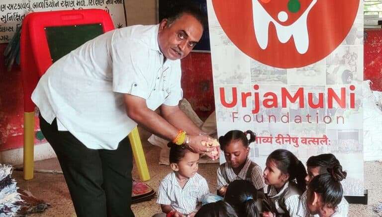 Distributed blankets and biscuits to children