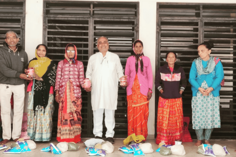 Distributes Pulses and Protein Powder to HIV-Positive Women